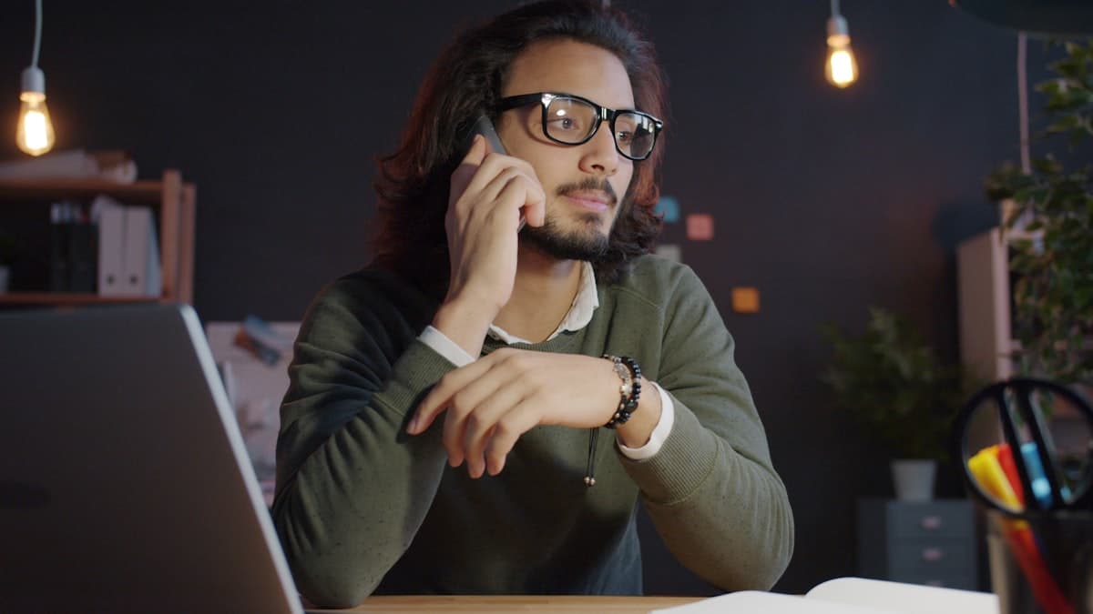 Travel agent working late on a booking